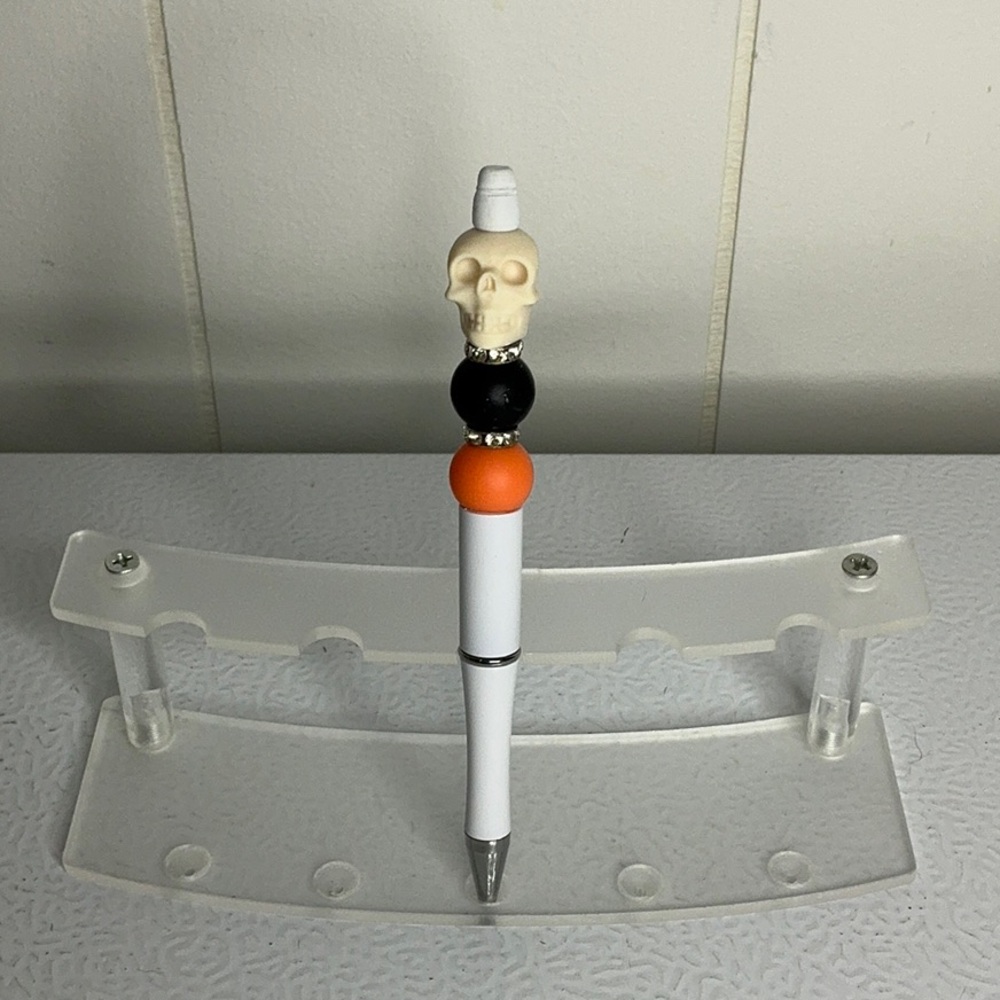 Skull Themed Pen with Orange and Black Accents